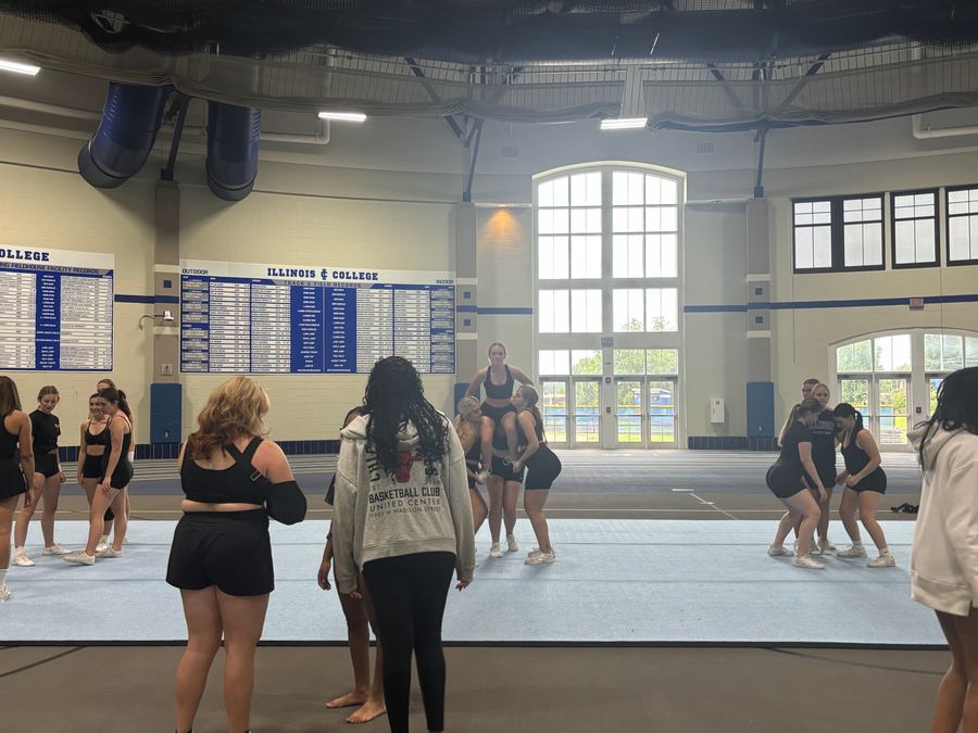 Multiple stunt groups working at the same time across the practice floor